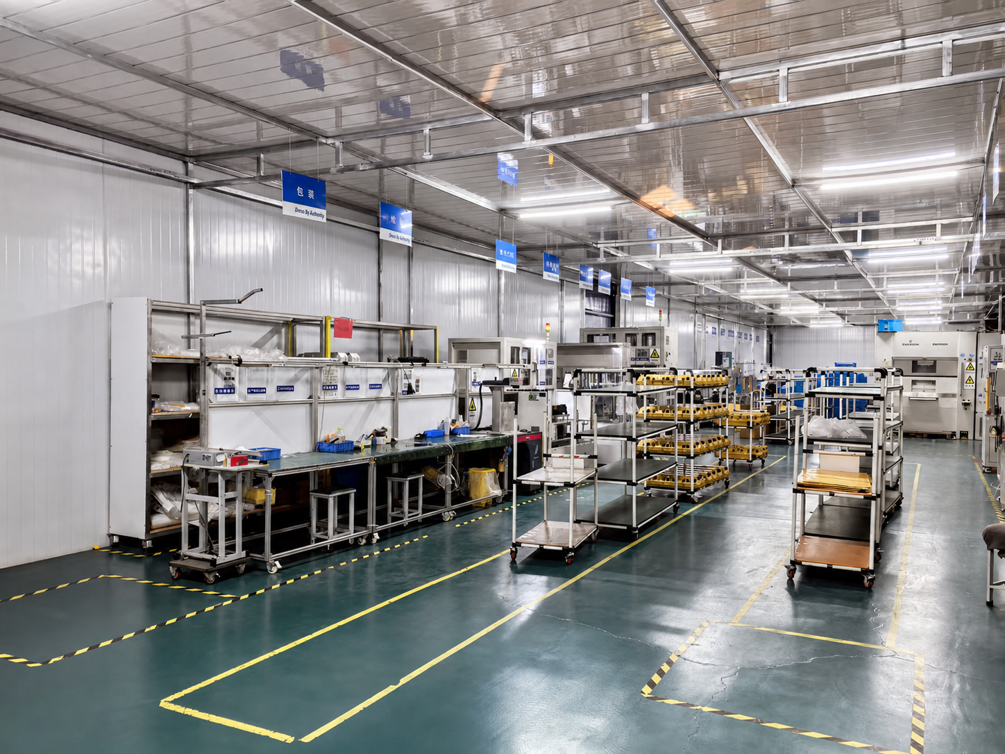 ACXTA assembly and packaging line with overhead process signage